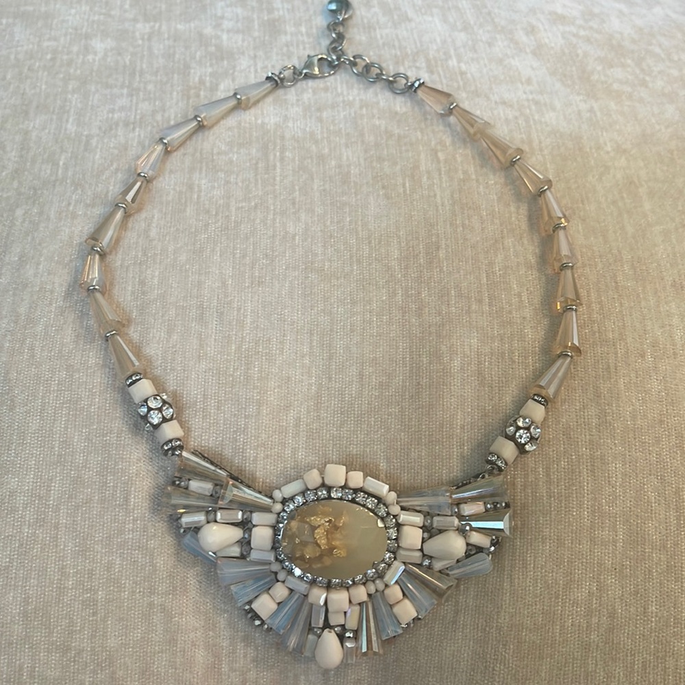 RUSH statement necklace.
